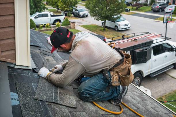 Professional Gutter Repair And Installation technician working in Pinehurst, TX